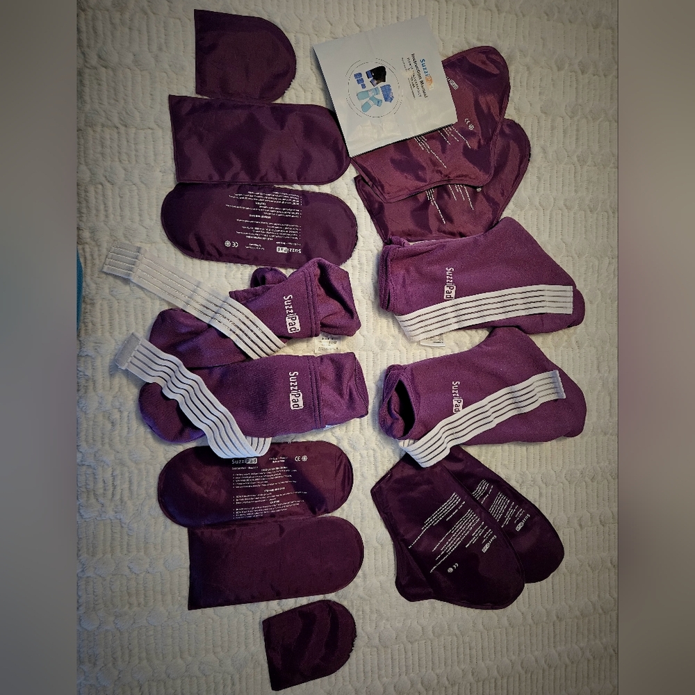 SUZZI PAD cold therapy socks and gloves with gel ice pack inserts.